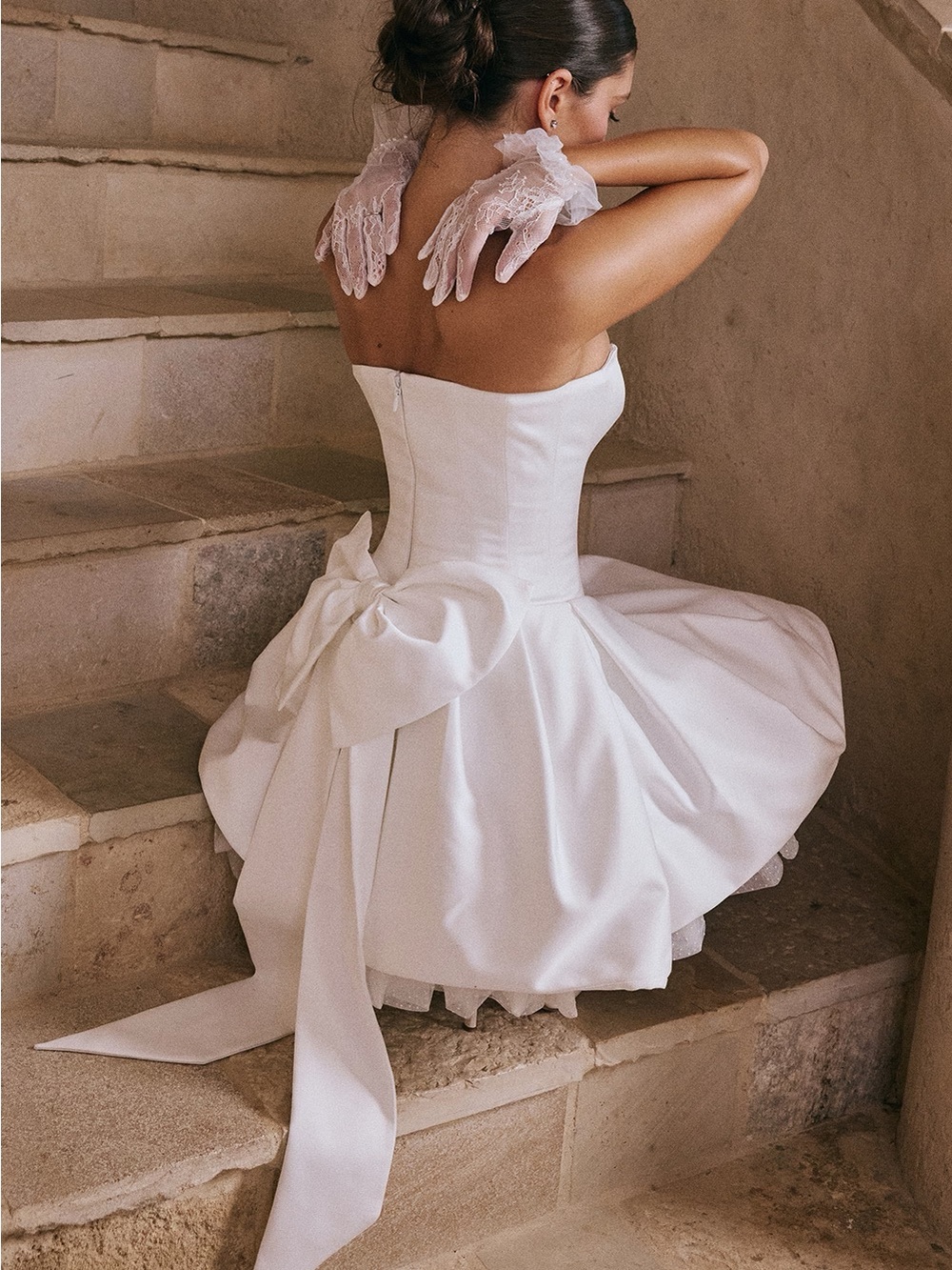 House of Cb NOELE
White Satin Strapless Bow Mini Gown - Picture 11 of 12